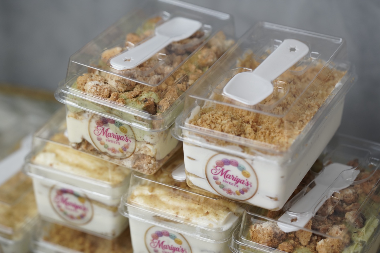 Small cakes in boxes — Medovik, Kyiv cake, Pavlova and more